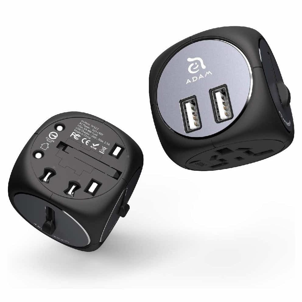 Захранване и адаптер за ел. мрежа с преходници за цял свят с 2xUSB-A изхода за зареждане на мобилни устройства - Adam Elements Omnia TA502 World Universal Travel Adapter (черен-сив)